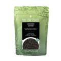 A 2oz bag of Full Leaf Tea Company Organic Assam Loose Leaf Tea.