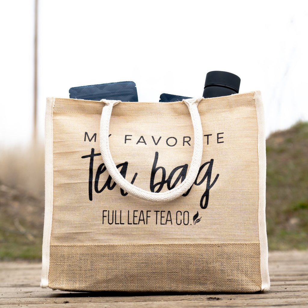 A "My Favorite Tea Bag" Tote Bag filled with some Full Leaf Tea Company items.